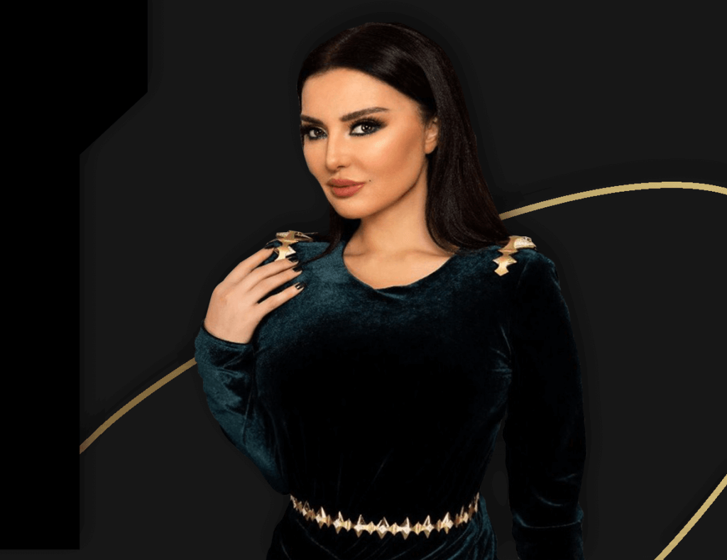 Woman in a dark velvet gown wearing Wazna gold shoulder and waist pieces from the Rank collection